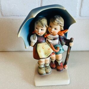 Hummel stormy weather 71 figurine imperfect Parkinson’s foundation